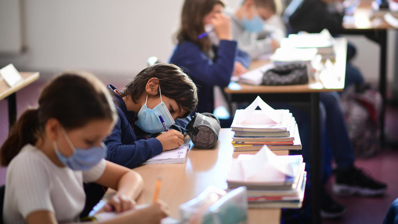 Millions of children across Europe return to school with mandatory face masks