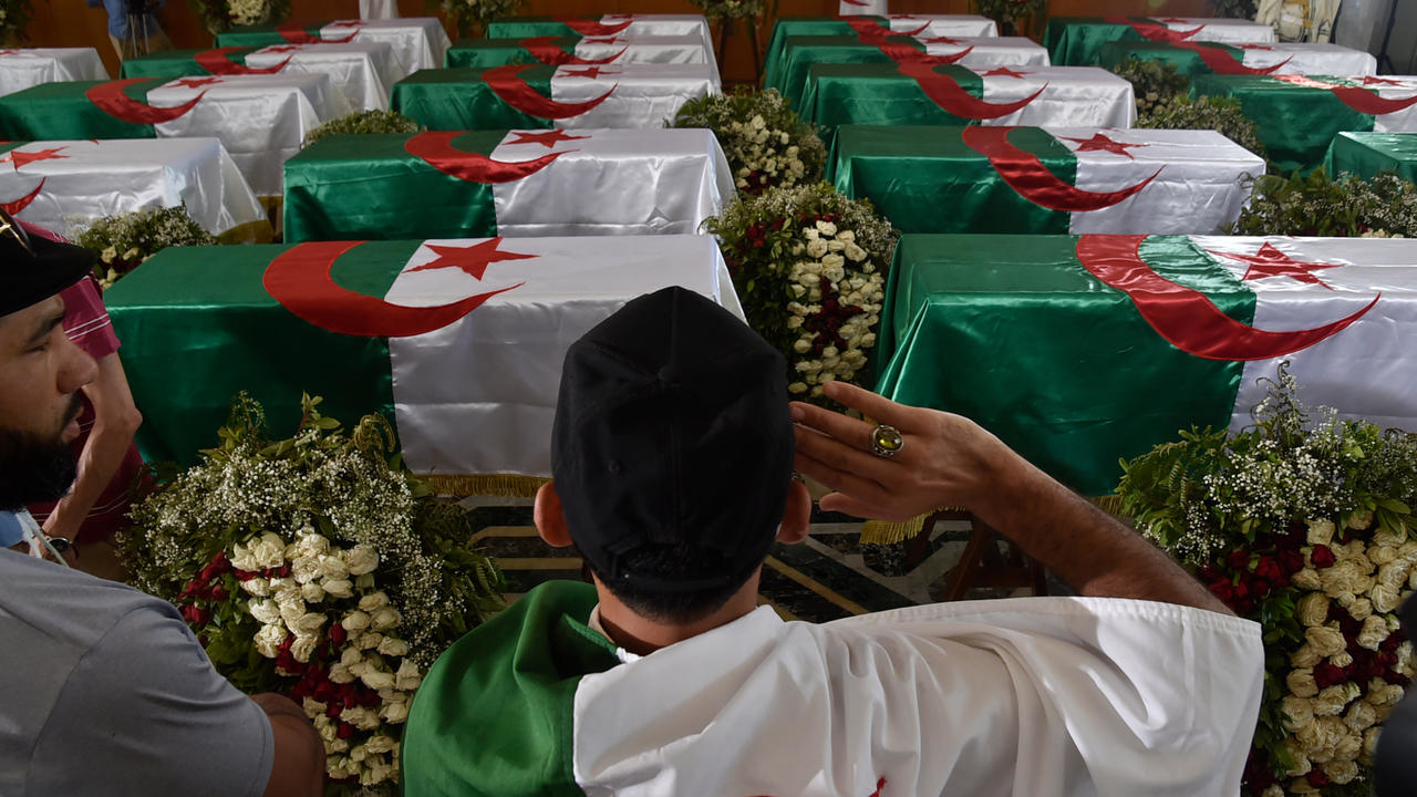 Algeria buries repatriated skulls of resistance fighters as it marks independence from France