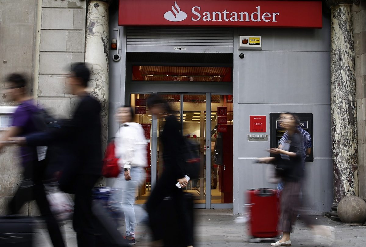 Santander Posts 11-Billion-Euro Loss for First Half, Confident About Outlook