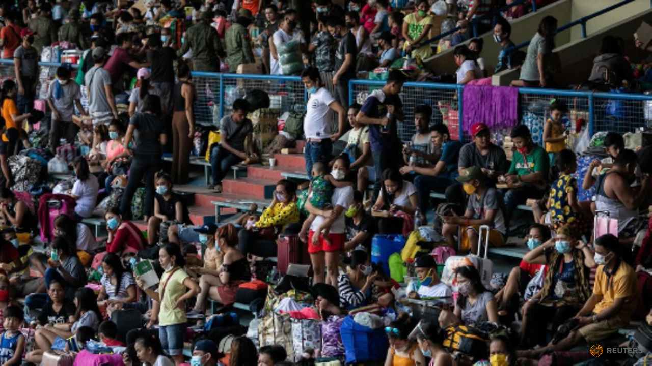 Thousands of stranded Filipinos crammed into baseball stadium amid COVID-19 risks