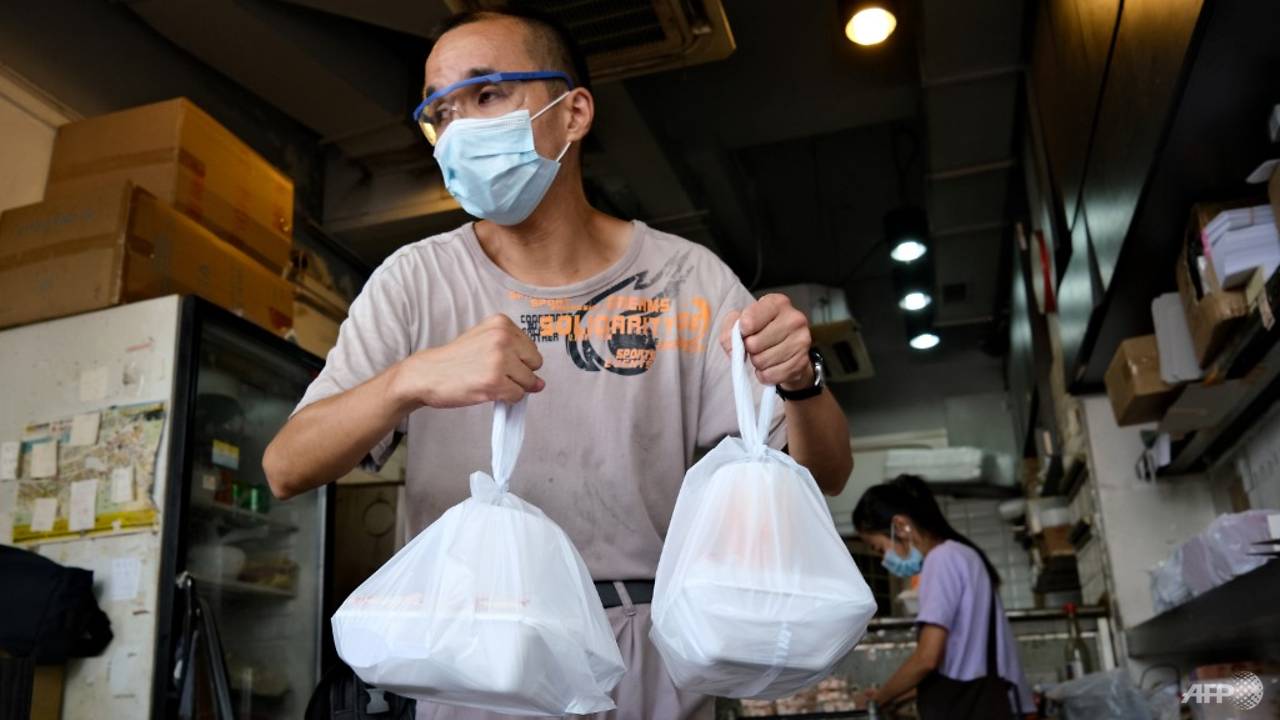 After COVID-19 dining ban, takeaway waste clogs Hong Kong’s pavements, parks and waterways