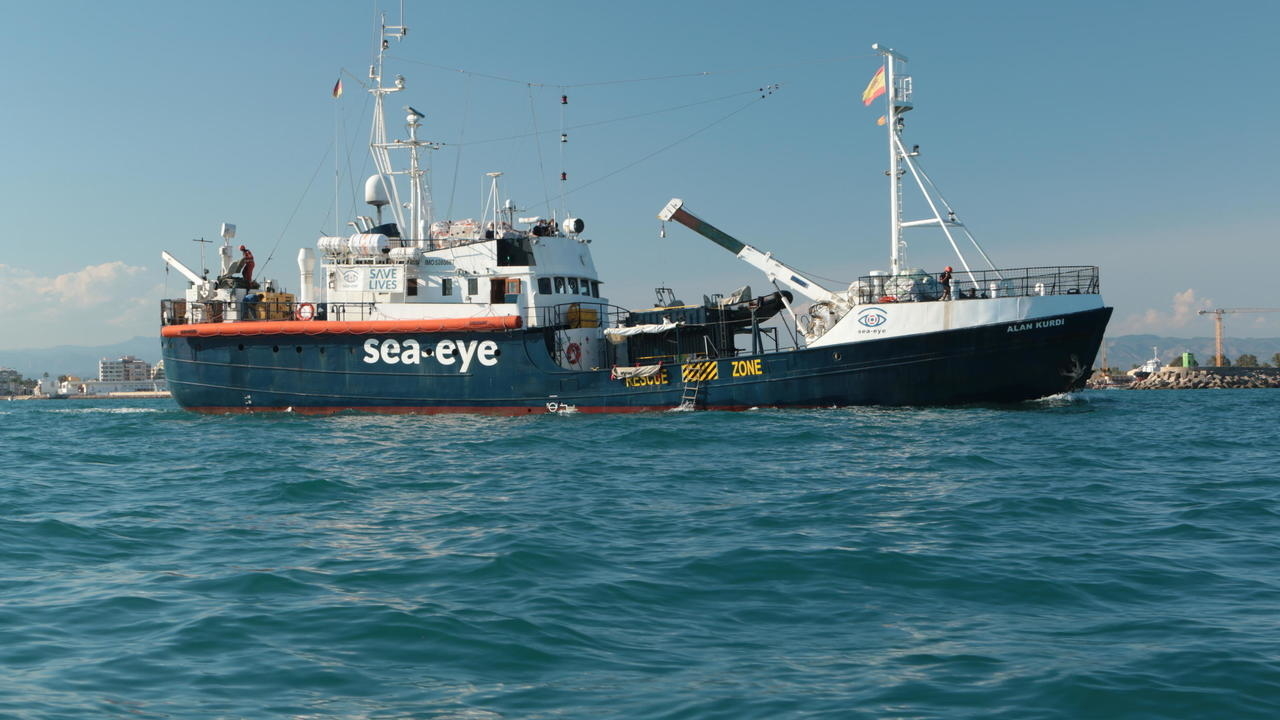 Italy lets migrant ship dock in Sardinia, no immediate disembarkment in sight