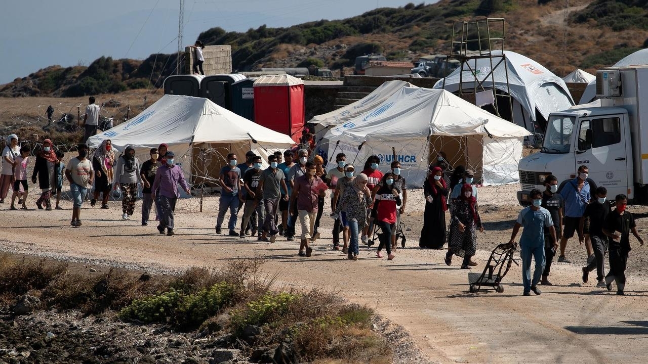 Most homeless Lesbos migrants transferred to new temporary camp after fire