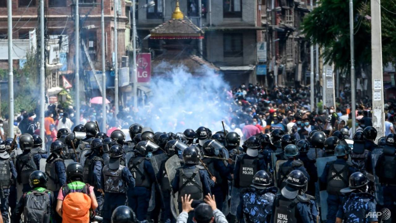 Nepal police clash with devotees defying COVID-19 ban for festival