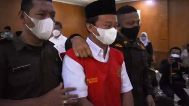 Indonesian principal given life term for raping 13 students