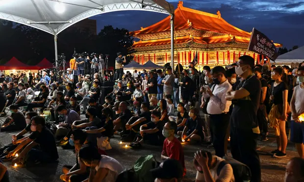 Candles, flags and a howl of pain: Taiwan remembers Tiananmen